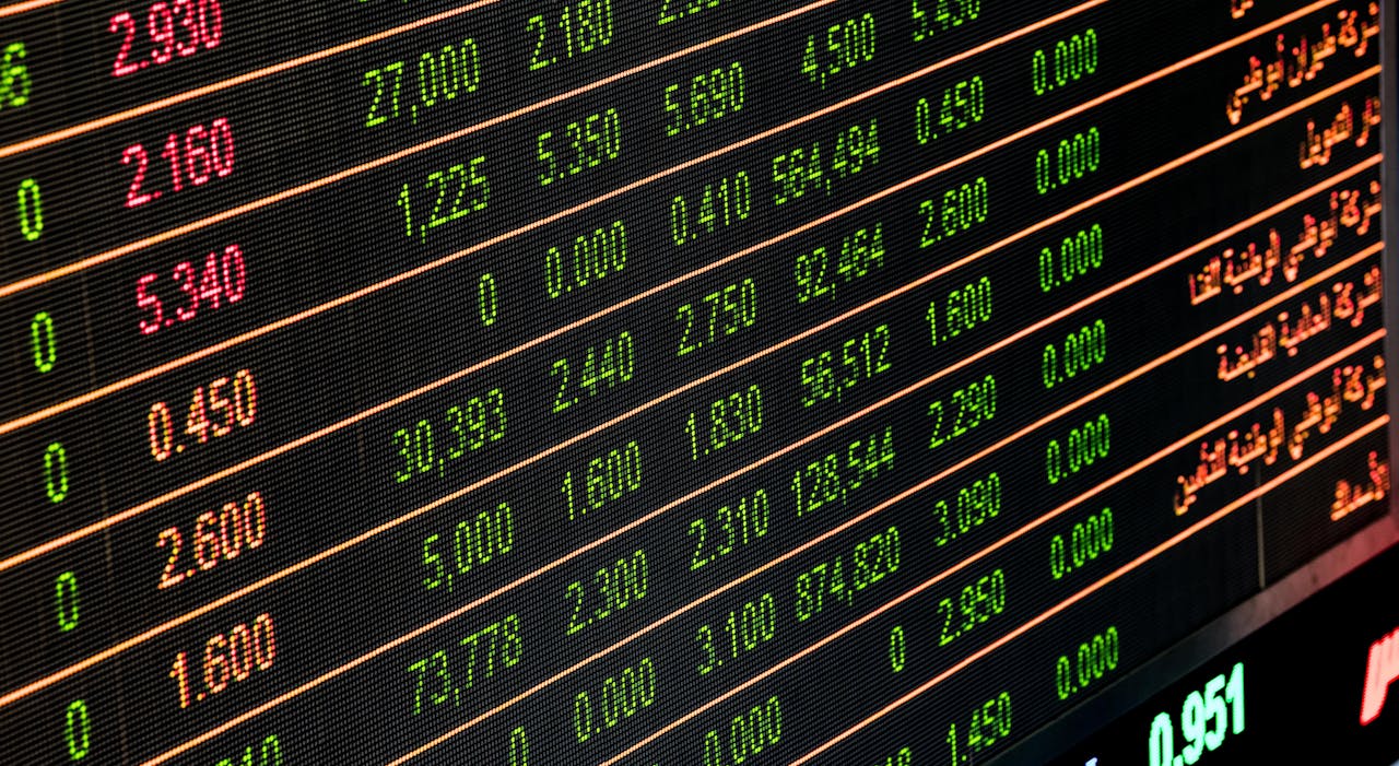 services-04 Detailed view of a stock market screen showing numbers and data, symbolizing financial trading.
